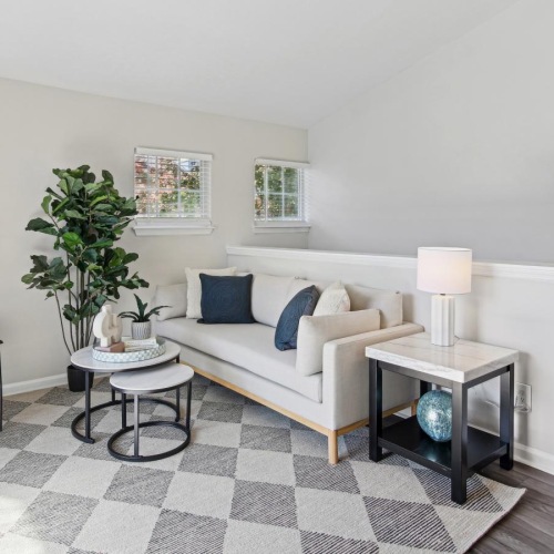 Gorgeous living areas to entertain and enjoy a living room with a couch and a coffee table