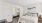a bedroom with a bed and a mirror