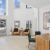 a leasing office room with a desk and chairs