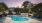 Swimming pool with lounge chairs at Muse ATL boutique apartments in Atlanta	