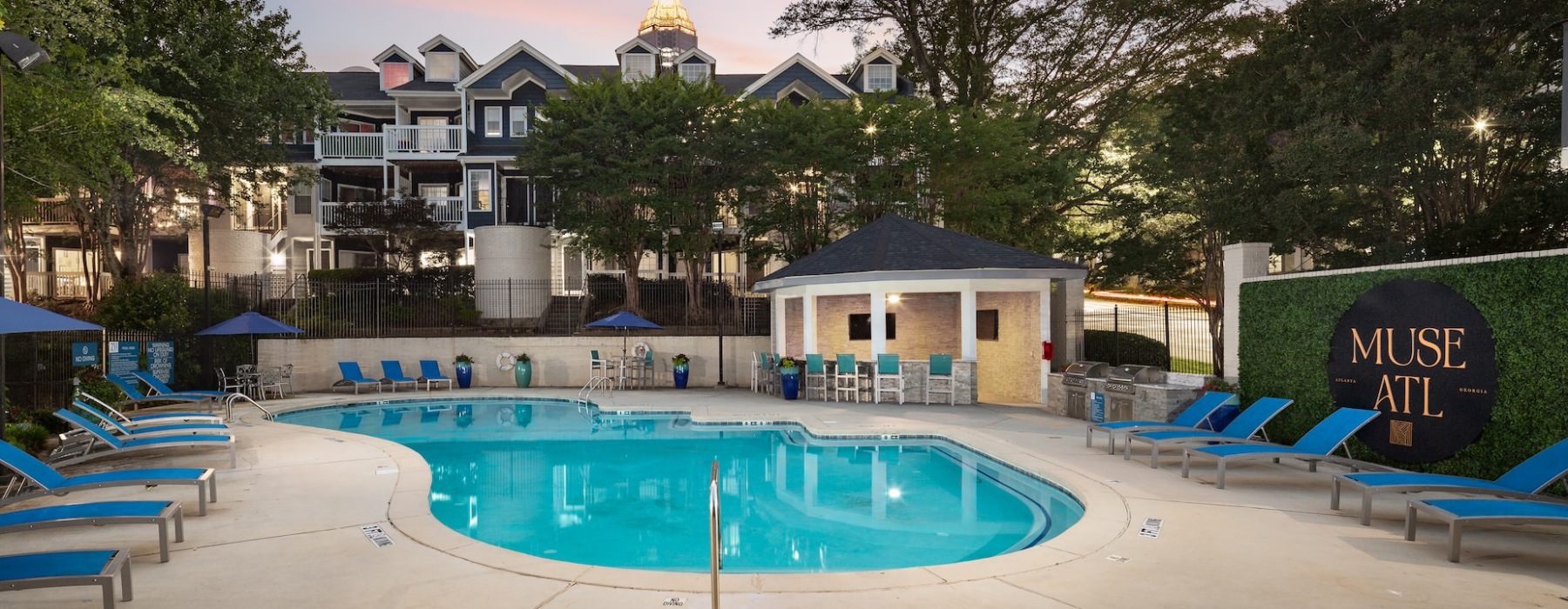 Swimming pool with lounge chairs at Muse ATL boutique apartments in Atlanta