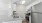 a kitchen with white cabinets